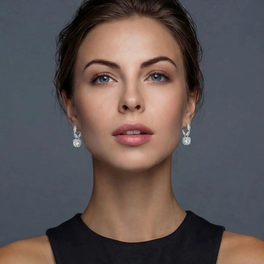Twisted Infinity Halo Moissanite Earrings | Equanimity Essence by Equanimity Essence.