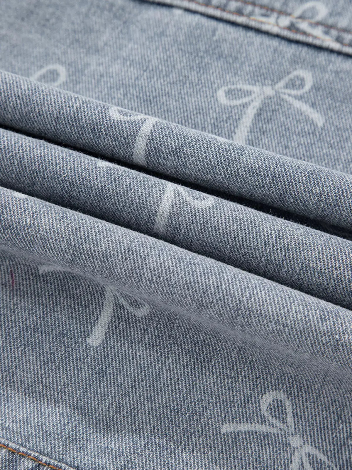Bow Knot Print Light Wash Raw Hem Denim Jacket by Partner Label