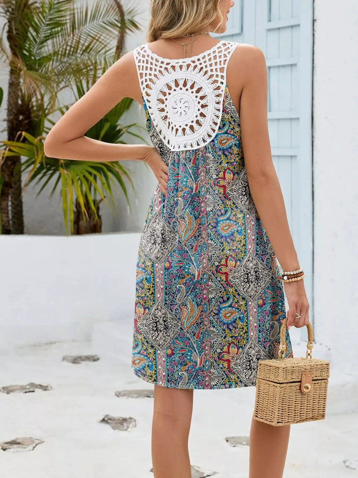 Floral Print V-Neck Crochet Back Mini Dress by Trendsi