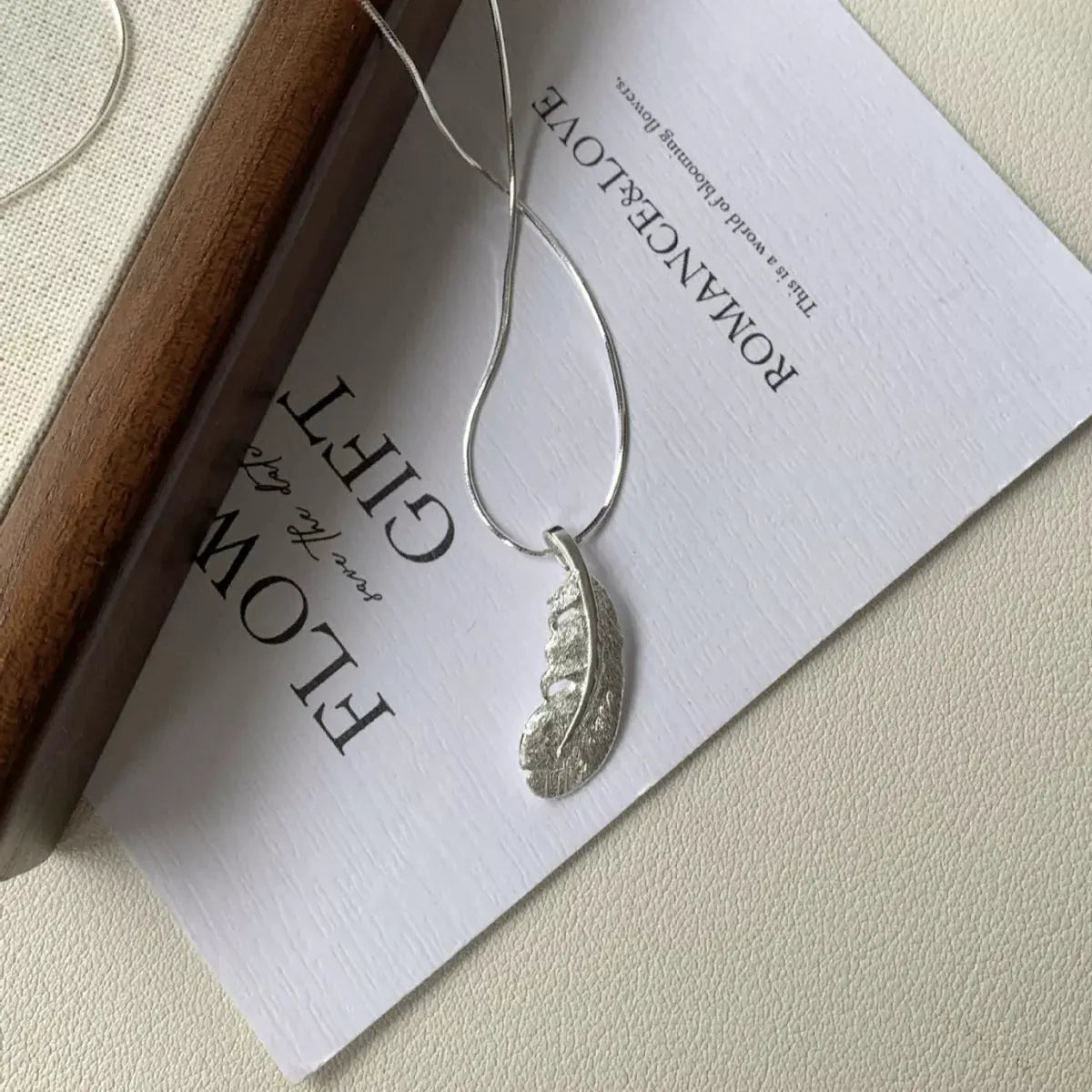 Feather Pendant Necklace by Partner Labels